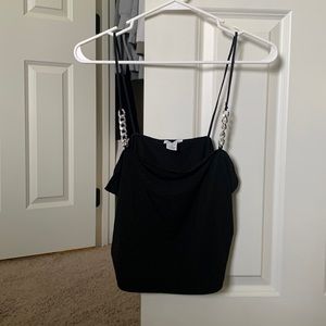 XL black spaghetti strap, with silver chains & diamonds. Never been worn.